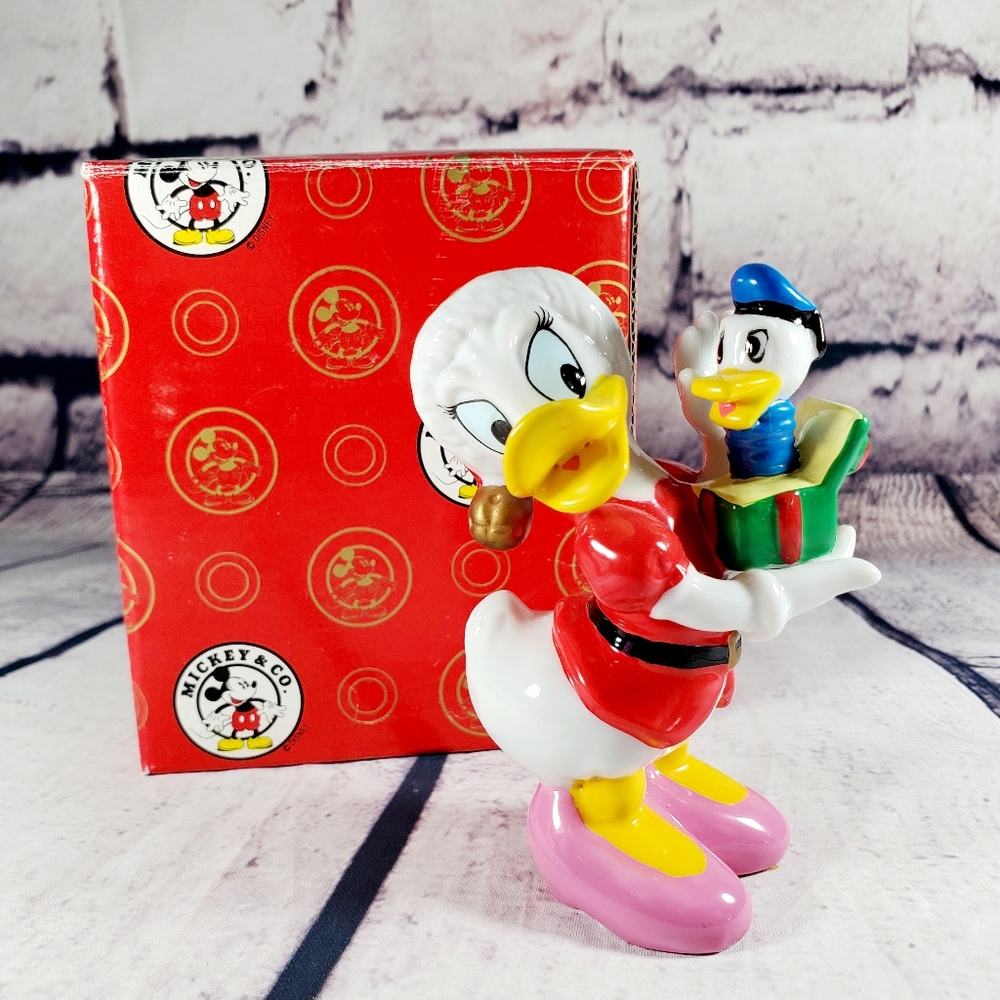 ENESCO Disney's Daisy Duck Porcelain Figurine